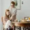 mother teaching daughter table manners