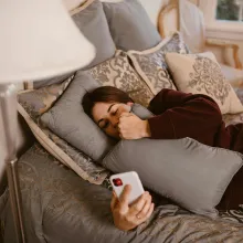 woman talking on camera on the phone