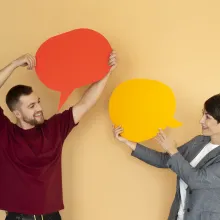 people holding chat bubbles